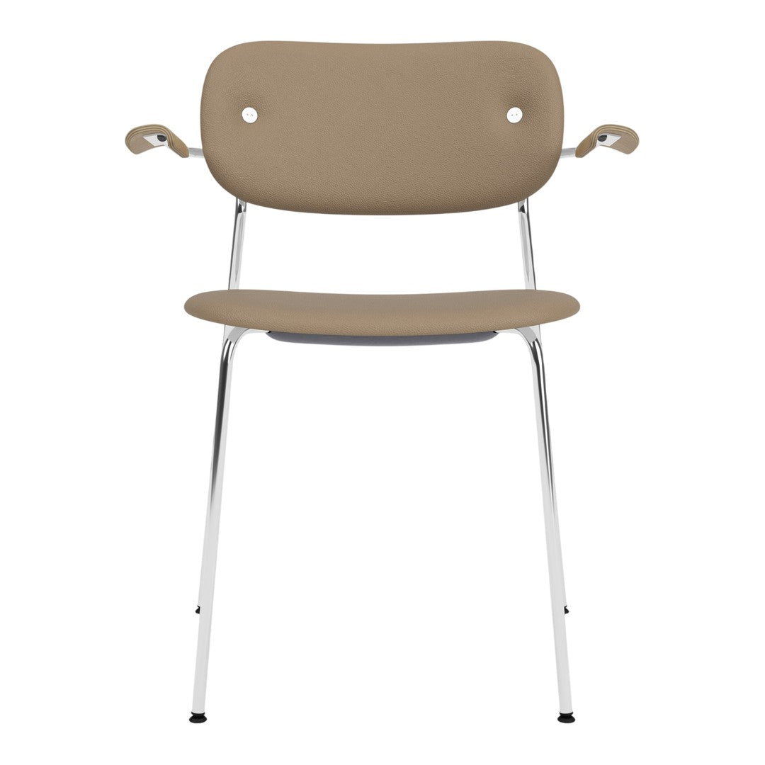Beige chair with sleek chrome legs and minimalist design, featuring smooth curves and a contemporary style.