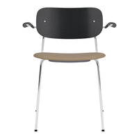 Modern chair with a sleek black backrest, light wood seat, and shiny chrome legs for a minimalistic look.