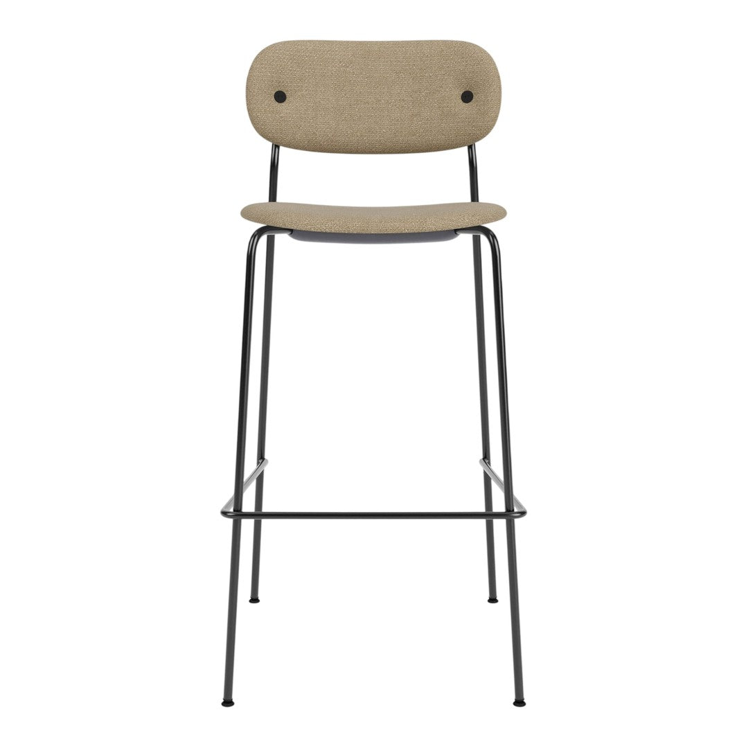 Tan upholstered bar stool with a minimalist black metal frame, featuring a simple, modern design.
