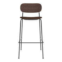 Brown wooden bar stool with a sleek black metal frame and minimalist design. Perfect for modern decor.