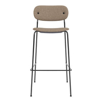 Brown textured fabric bar stool with a sleek black metal frame, minimalist design. Perfect for modern spaces.