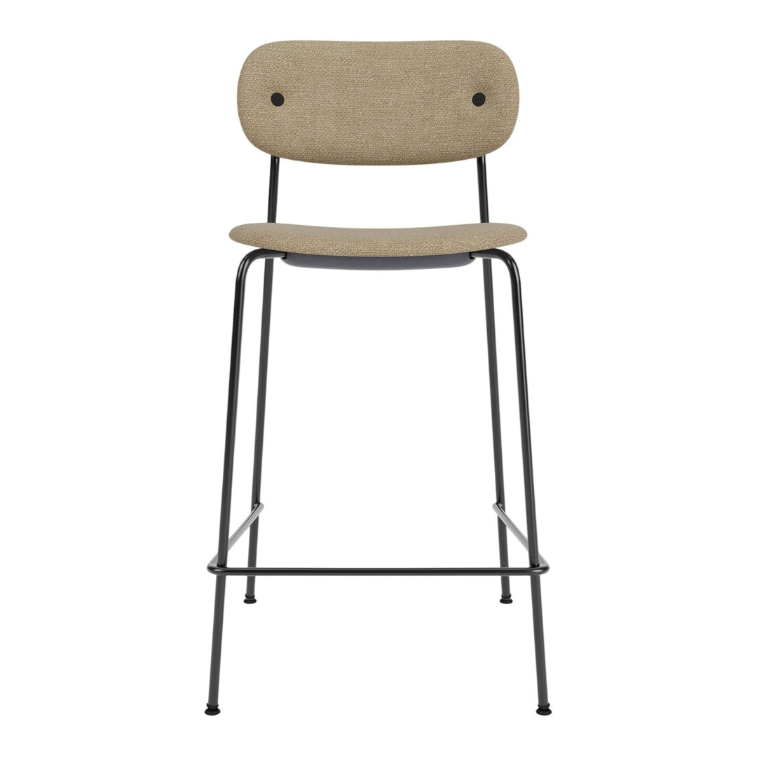 Beige upholstered bar stool with black metal legs and simple, modern design.
