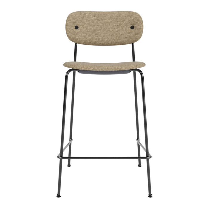 Beige upholstered bar stool with black metal legs and simple, modern design.
