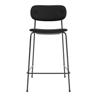 Black modern bar stool with minimalist design and smooth finishes. Perfect addition for stylish home decor.