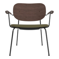 Modern chair with a dark wood back, olive green cushion, and sleek black metal legs. Ideal for stylish interiors.