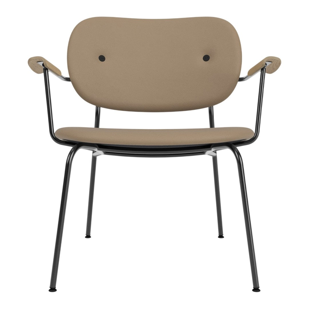 Tan upholstered chair with black metal frame and two distinctive button accents on the backrest. Modern and stylish design.