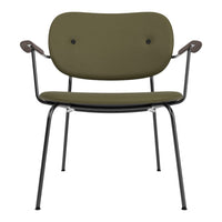 Olive green chair with a minimalist design, featuring a smooth surface and black metal frame.