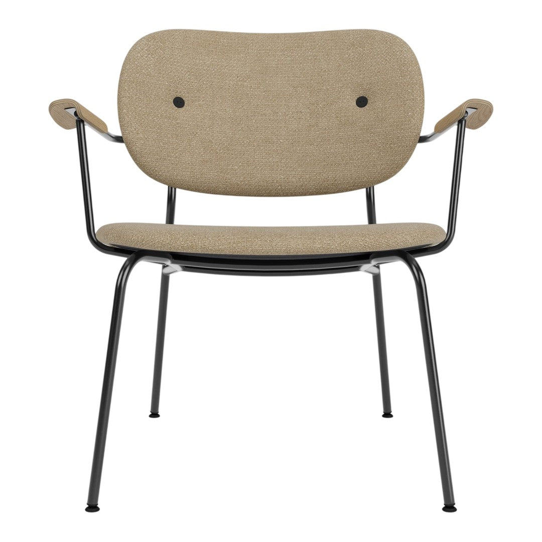 Beige upholstered chair with a minimalist design and black metal frame, featuring subtle button accents.