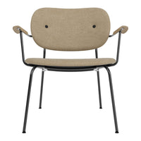 Beige upholstered chair with a minimalist design and black metal frame, featuring subtle button accents.
