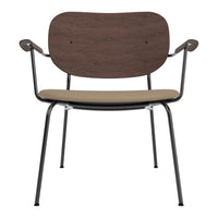 Brown wood and beige cushioned seat with black metal legs, creating a modern and elegant design.