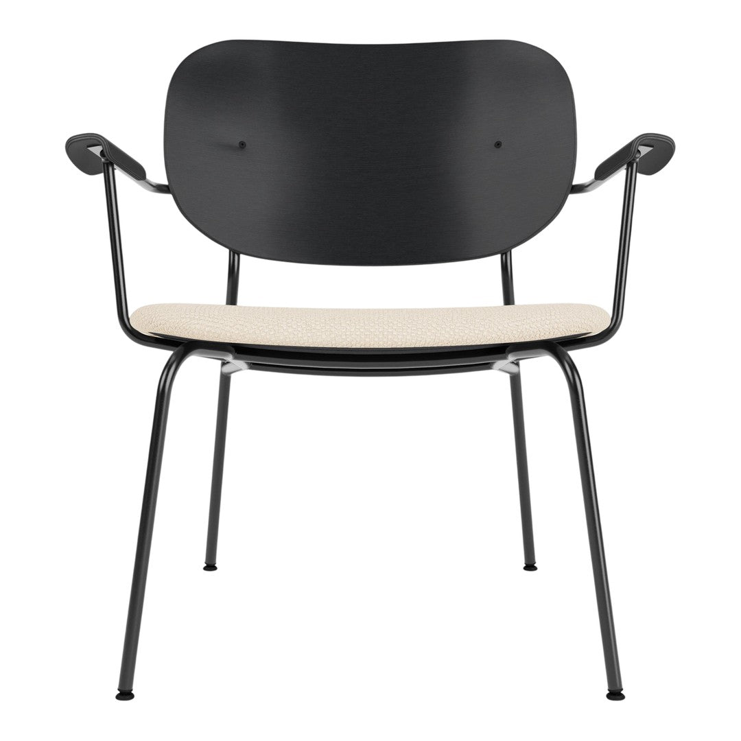 Black chair with a streamlined design and a neutral beige seat, featuring a minimalist aesthetic.