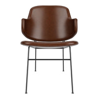 Brown leather chair with smooth texture and minimalist black metal legs, perfect for modern decor.