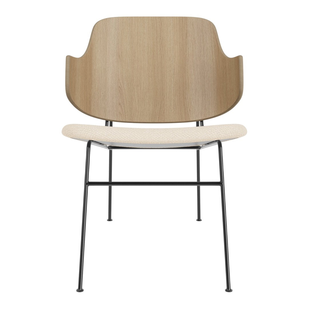 Light wood and beige chair with black metal legs, featuring smooth, minimalist design. Perfect for modern decor.