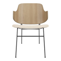 Light wood and beige chair with black metal legs, featuring smooth, minimalist design. Perfect for modern decor.