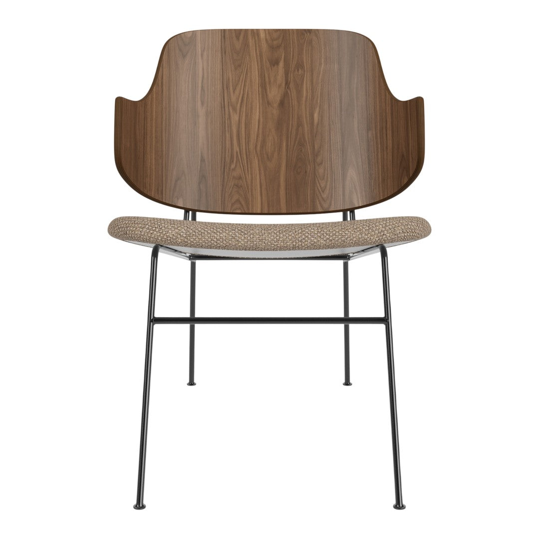 Wooden chair with a dark walnut backrest and beige fabric seat, accented by black metal legs. Minimalist design.
