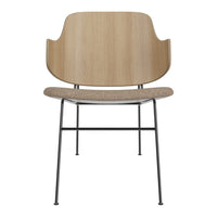 Minimalist wooden chair with a natural wood finish and neutral fabric seat, featuring sleek black metal legs.
