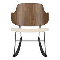 Walnut wood backrest with a beige seat and black metal rocking base, showcasing a modern minimalist design.