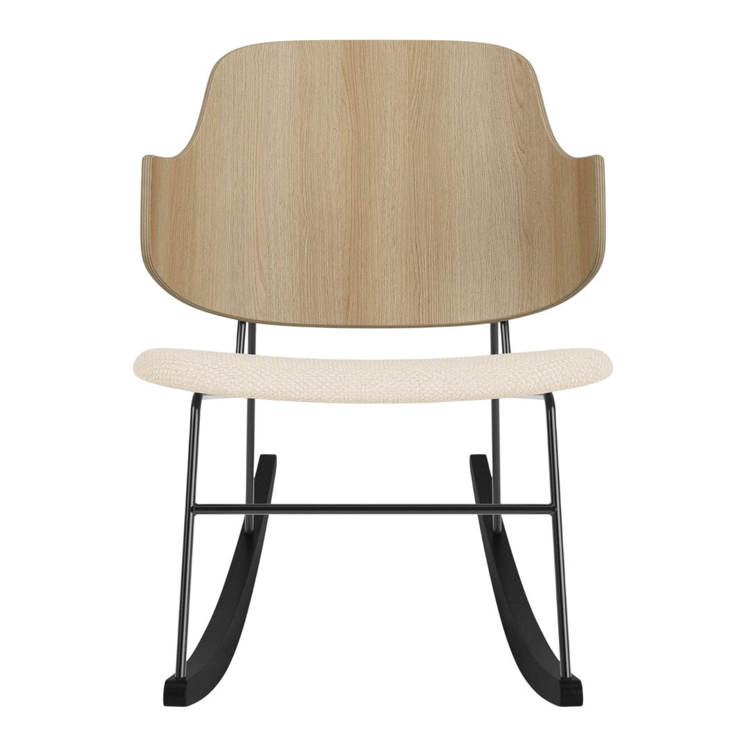 Light oak and cream rocking chair with sleek black metal base, featuring a smooth, minimalist design.