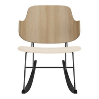 Light oak and cream rocking chair with sleek black metal base, featuring a smooth, minimalist design.