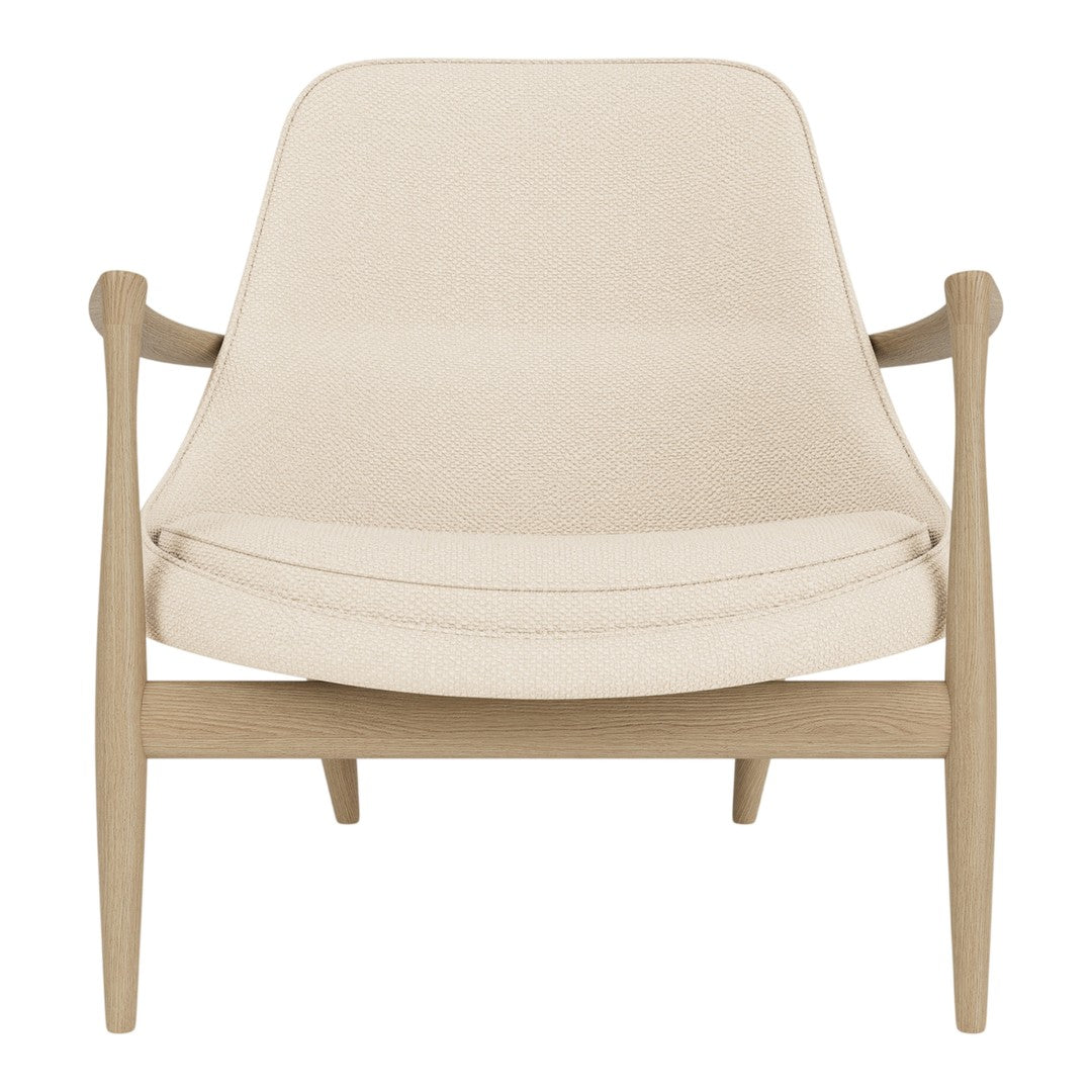Beige upholstered chair with a smooth texture and minimalistic wooden frame. Modern, neutral tones for versatile decor.