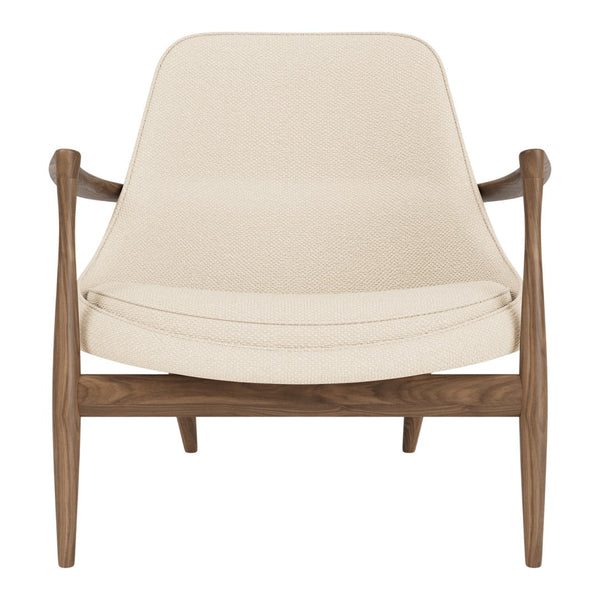 Cream-colored armchair with a smooth textured seat and rich walnut wooden frame. Modern and minimalist design.