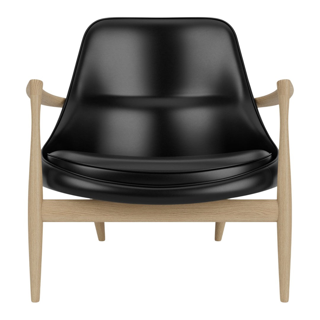 Modern black armchair with a sleek, smooth finish and light wooden frame, combining contemporary design with natural tones.