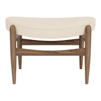 Beige plush upholstery with a subtle texture, complemented by a warm walnut wood frame. Elegant and stylish design.