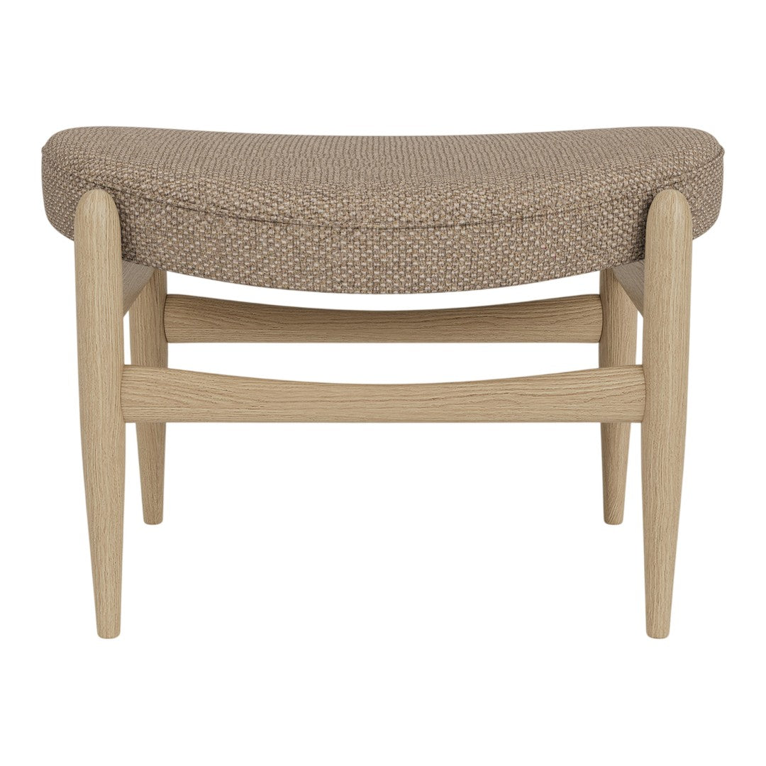 Beige textured upholstery with a subtle woven pattern, complemented by natural wood legs. Perfect for modern decor.