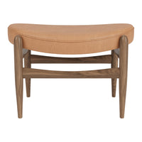 Tan leather upholstered stool with a curved design and wooden legs in a natural finish. Elegant and modern.