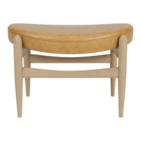 Brown leather cushion atop light wood legs, featuring a curved, minimalist design. Ideal for modern decor.
