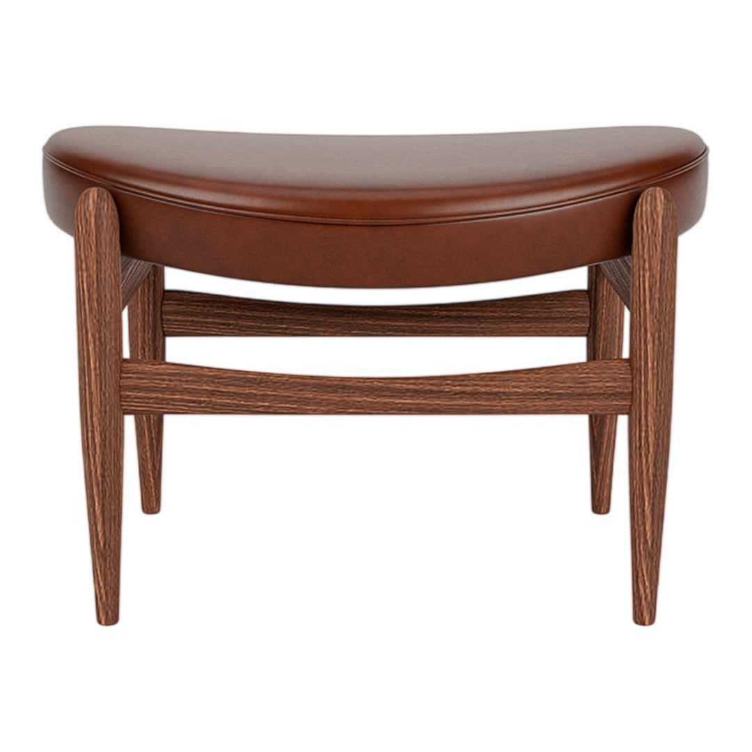 Brown leather top with wooden legs, featuring a sleek, curved design in a mid-century modern style.