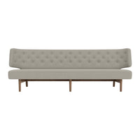 Modern light gray tufted sofa with wooden legs, featuring a sleek, minimalist design. Perfect for contemporary spaces.