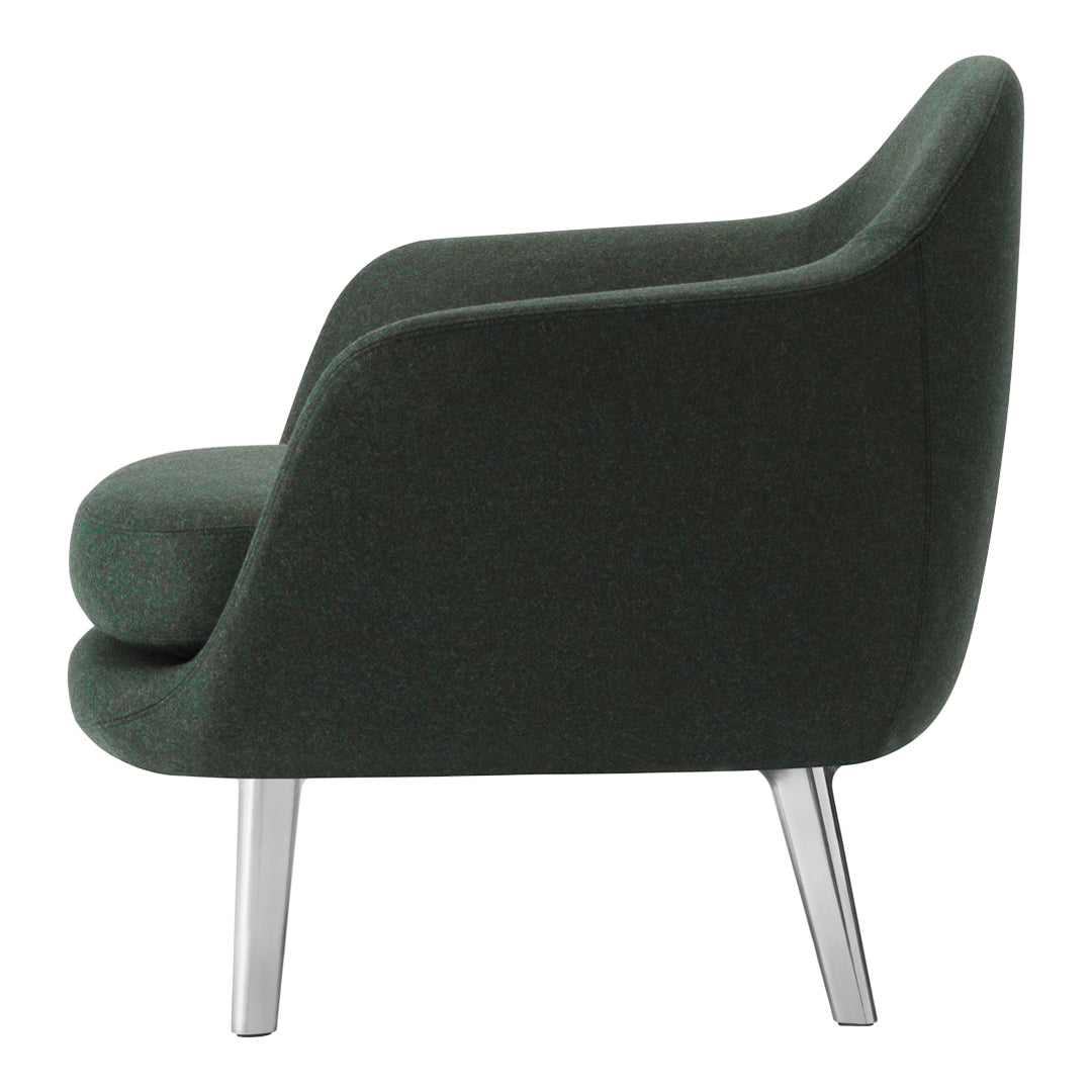 Green upholstered chair with a smooth finish and sleek silver legs, showcasing a modern and minimalist design.