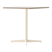 Square table with a textured light gray top and a sleek cream-colored metal base. Minimalist design for modern spaces.