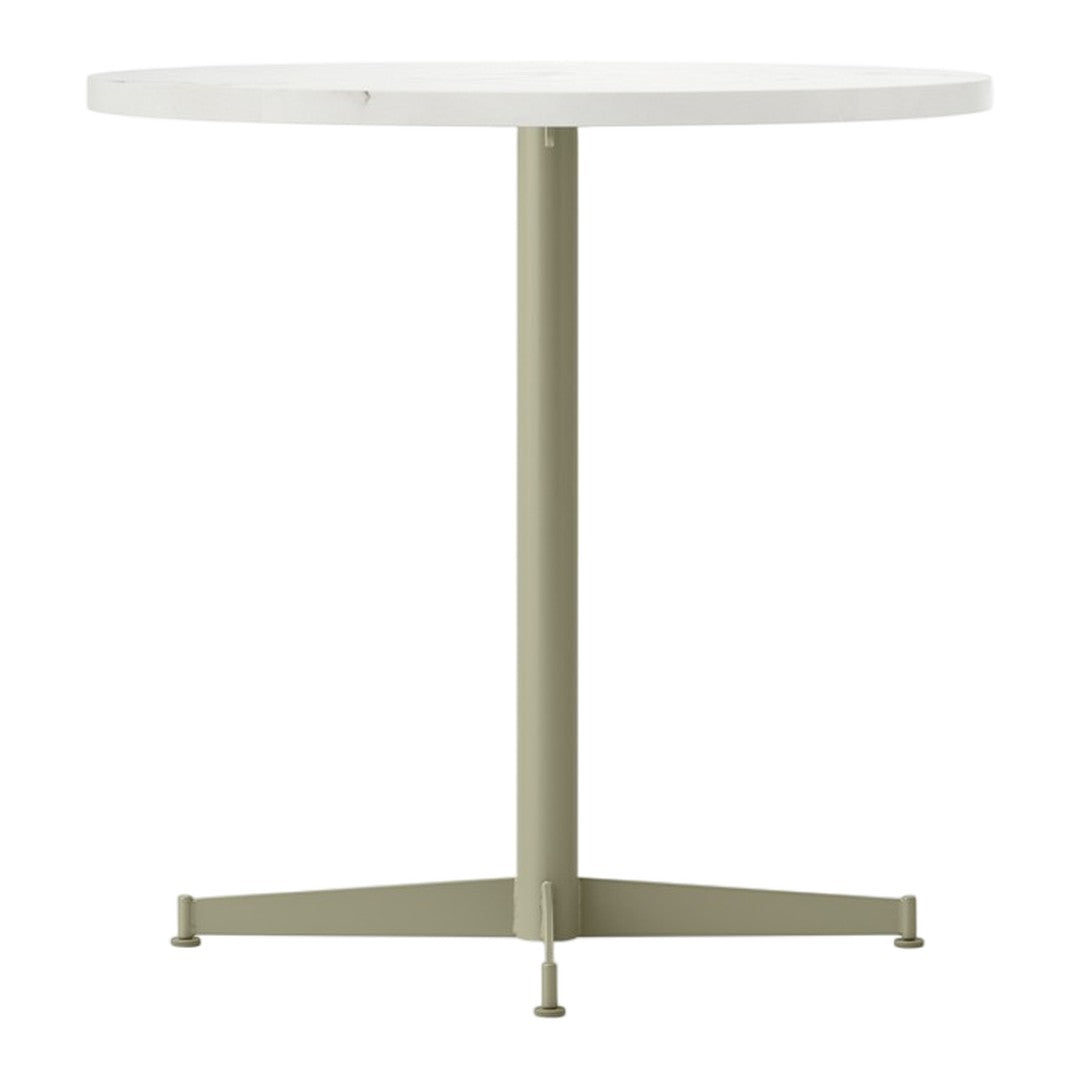 Round white table with a sleek pale green base. Minimalist design suitable for modern interiors.