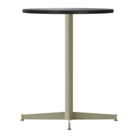 Round table with a black top and an olive green base, featuring a minimalist design. Perfect for contemporary spaces.