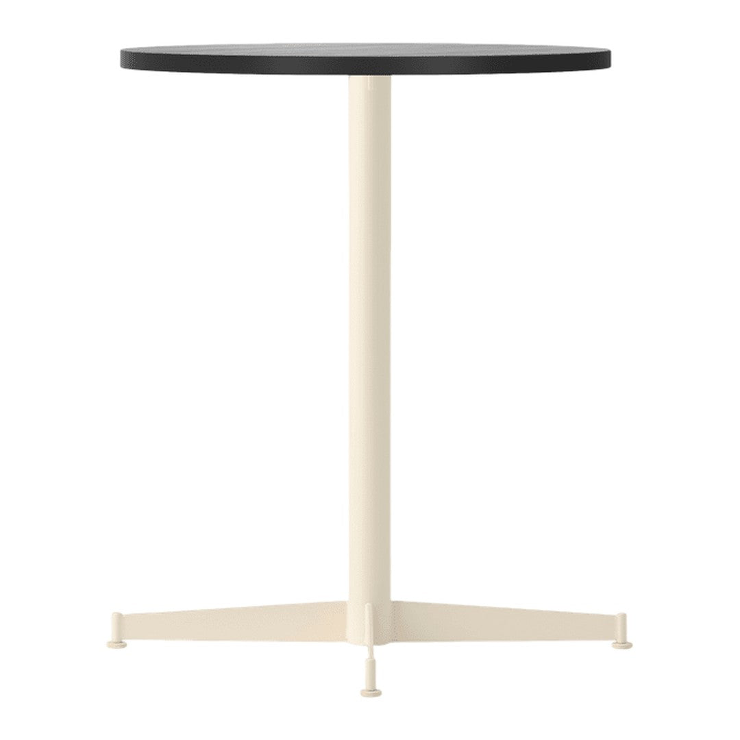 Black round tabletop with a cream-colored base and tripod legs, showcasing a sleek and modern design.