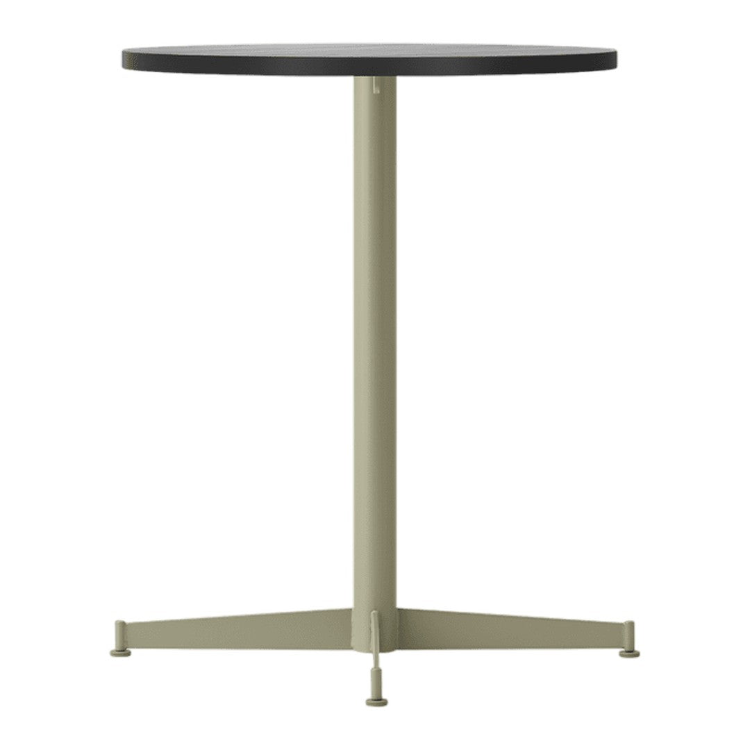 Round table features a black top and light olive green base, showcasing a sleek, modern design.