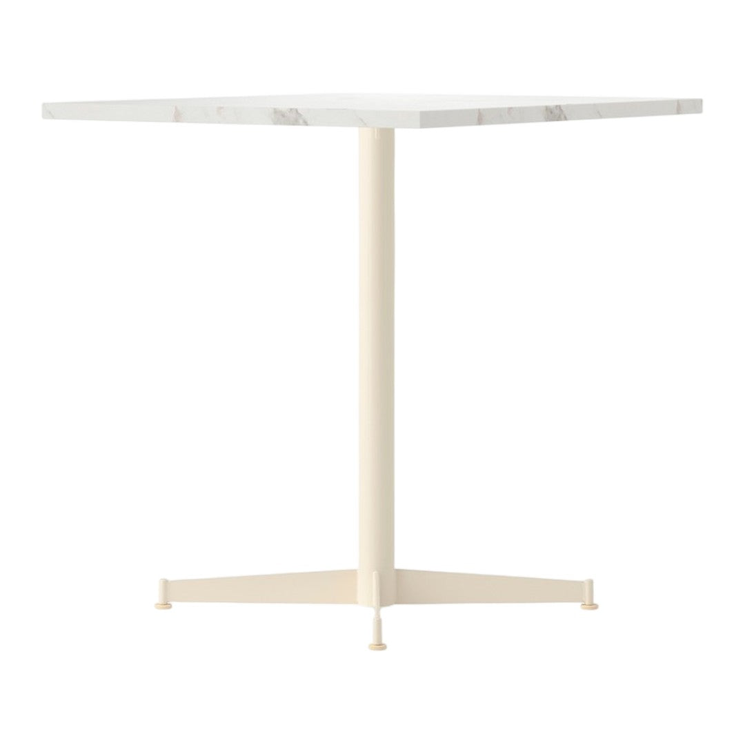 Square white marble table with a sleek beige metal base, minimalist design, perfect for modern decor.