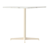 Square white marble table with a sleek beige metal base, minimalist design, perfect for modern decor.