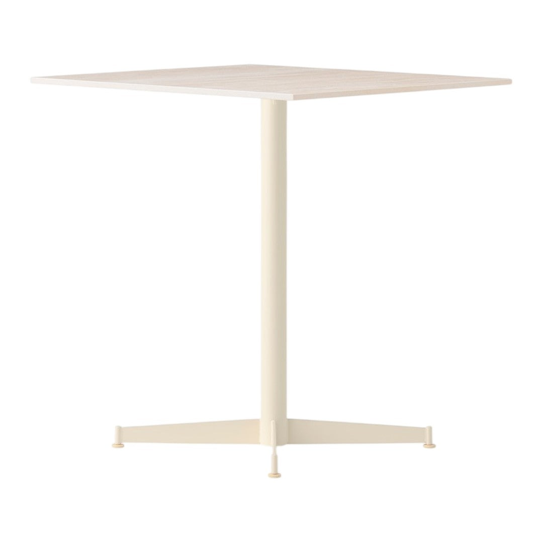 Square dining table in a soft cream color with a minimalist design and smooth surface. Perfect for modern decor.