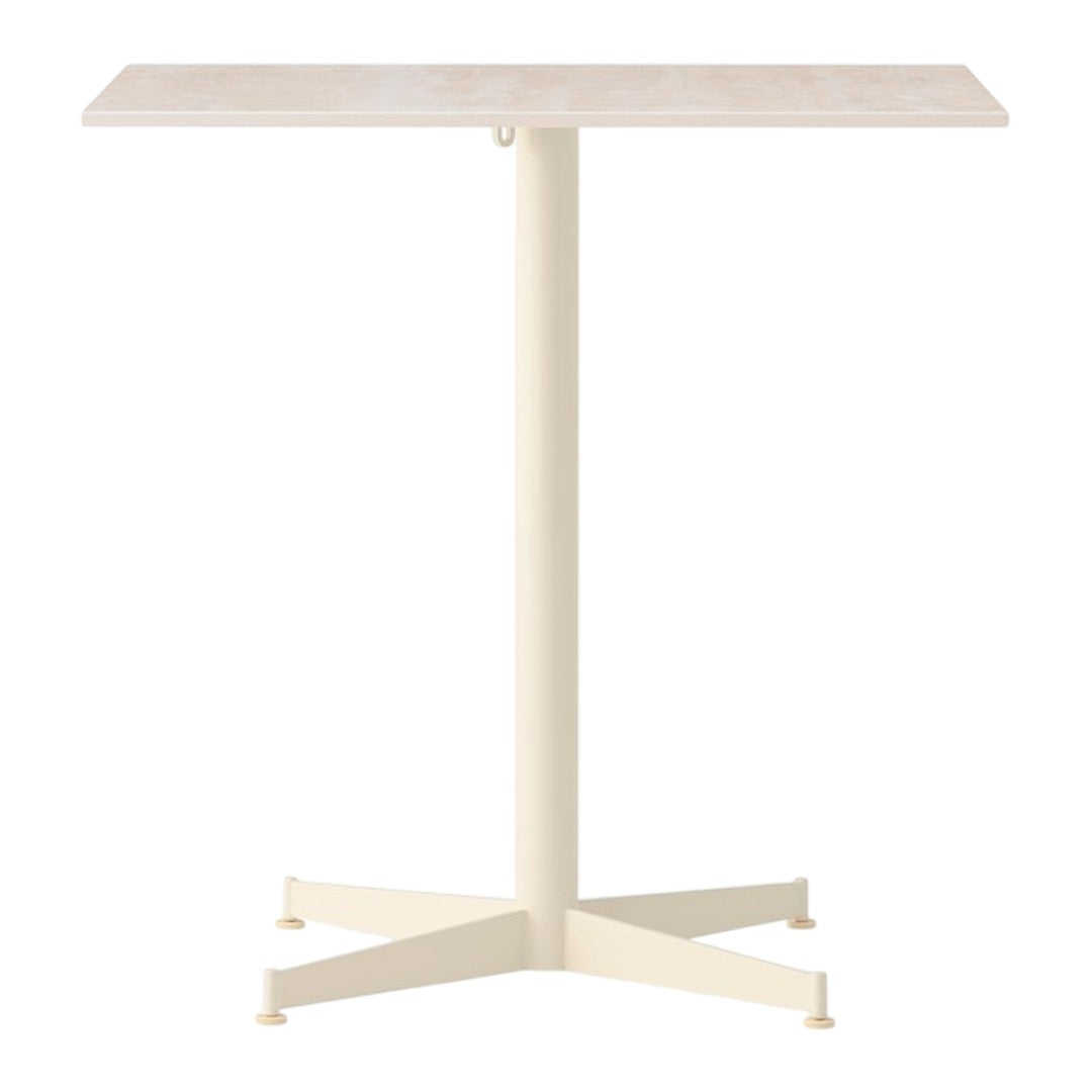 Cream-colored table with a sleek, smooth surface and a minimalist design, featuring a sturdy cross-base.