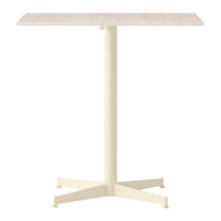 Cream-colored table with a sleek, smooth surface and a minimalist design, featuring a sturdy cross-base.