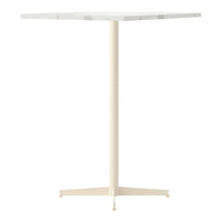 White marble tabletop with subtle gray veining, paired with a sleek cream-colored base. Modern minimalist design.
