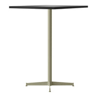 Square table with a black top and light green metal base, featuring a minimalist design and sleek lines.