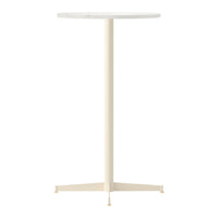 Round white tabletop with a sleek cream-colored metal base, minimalistic design, perfect for modern spaces.