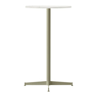 White round tabletop with a light olive green metal base, featuring a sleek, minimalist design.