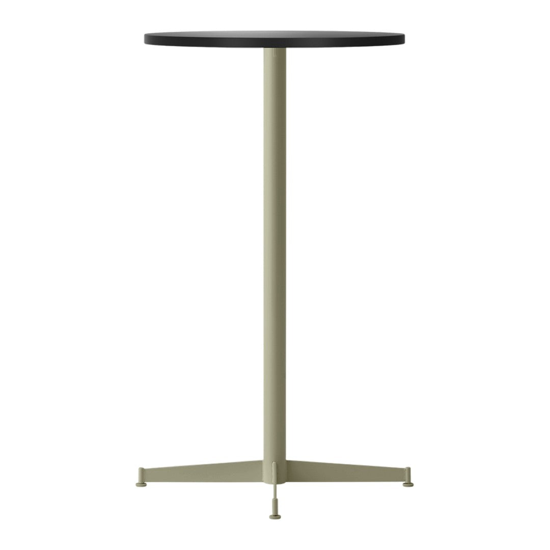 Black round tabletop with a light olive green tripod base, featuring a sleek, minimalist design.