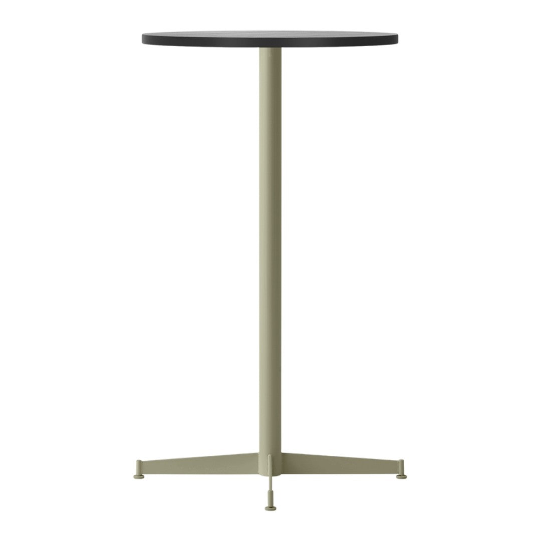 Round tabletop in black with a sleek light green base, minimalist design suitable for modern decor.