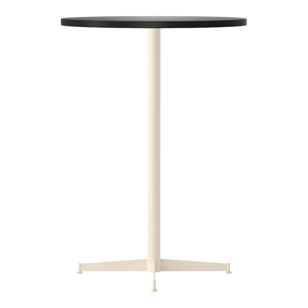 Round black tabletop with a sleek cream-colored base, featuring a minimalist design ideal for modern spaces.